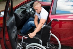 Disabled Car Driver With A Wheelchair