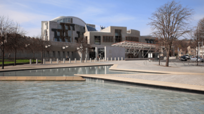 The Scottish Parliament, a modern building with water features in front of it