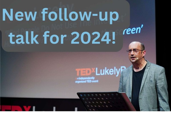 : Clive giving his TEDx Talk in 2022. He is standing in front of a lectern. Text reads “New follow-up talk for 2024!”